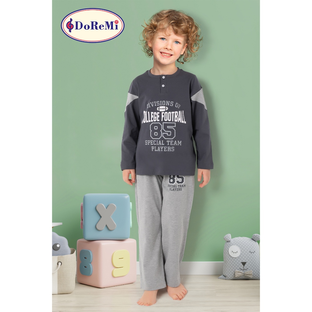 بجامة ولادية من دوريمي باللون الرمادي الدخاني لعمر 6–7 سنوات