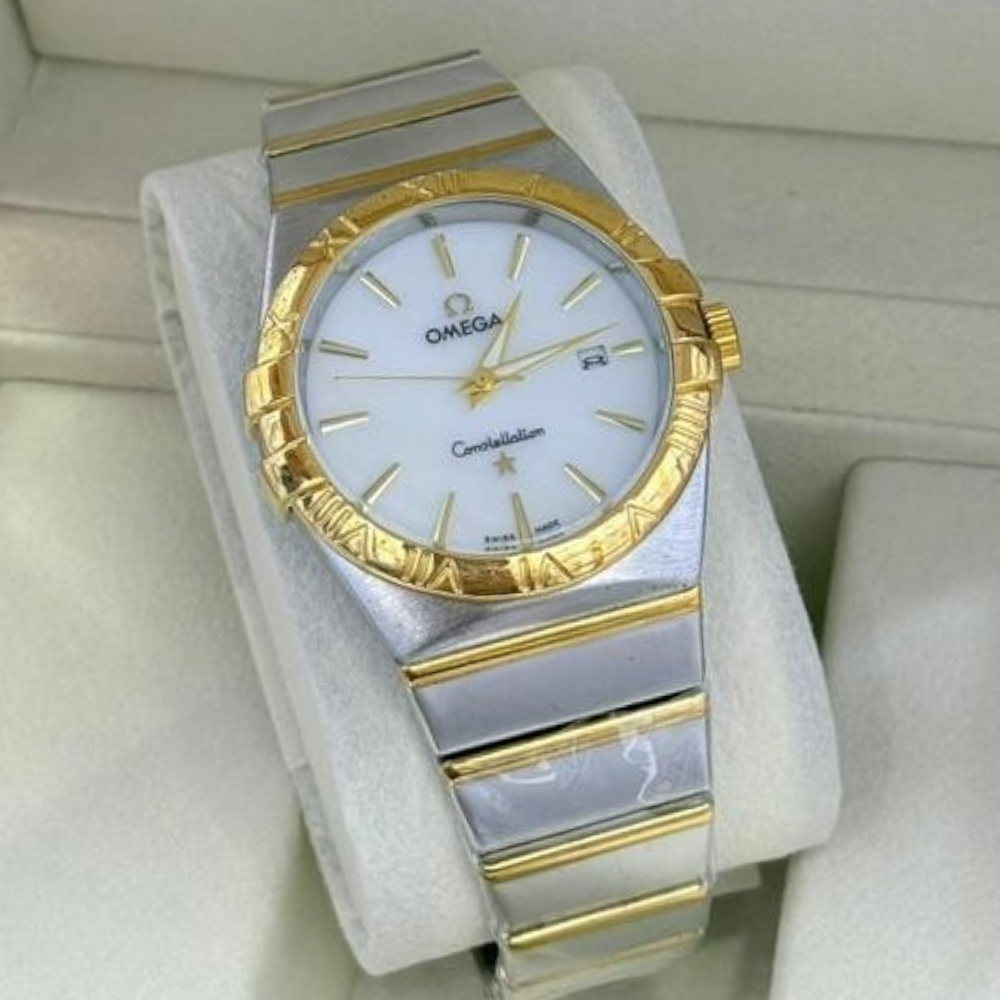 ساعة اوميجا رجالي كوبي ابيض اطار ذهبي سلس فضي مغذى بالذهبي